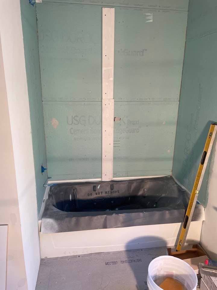 Same Tub Surround, In Progress, Gray & Sons Contracting project in Southern Maryland